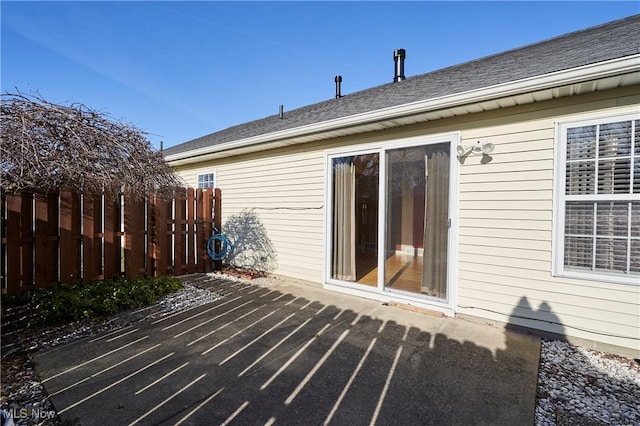 view of patio / terrace featuring fence