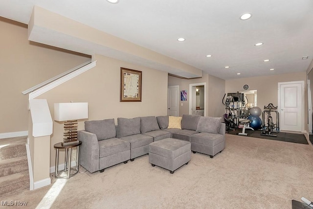 carpeted living area featuring recessed lighting, stairway, and baseboards