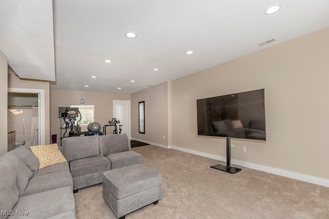 living room featuring recessed lighting, visible vents, baseboards, and carpet