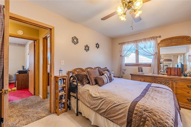 bedroom featuring carpet flooring and a ceiling fan