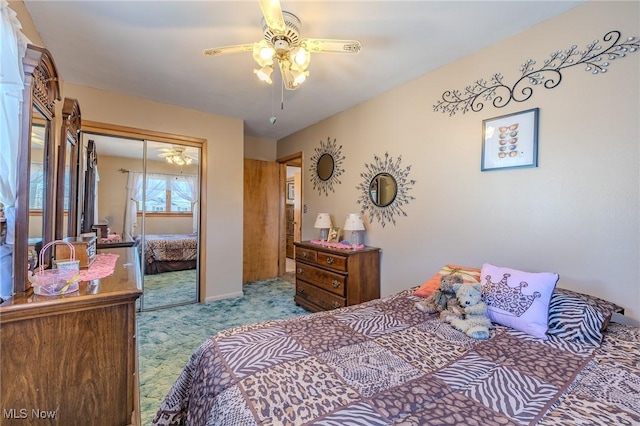 bedroom featuring a closet, a ceiling fan, and carpet floors