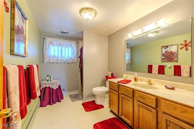 full bathroom with visible vents, a baseboard heating unit, toilet, a stall shower, and vanity