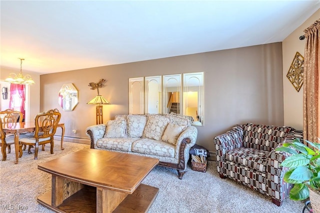 carpeted living area with a notable chandelier and a baseboard radiator