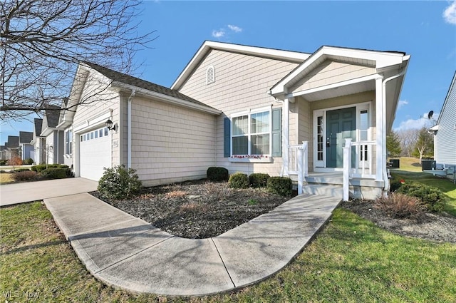 view of front of home with a garage and concrete driveway