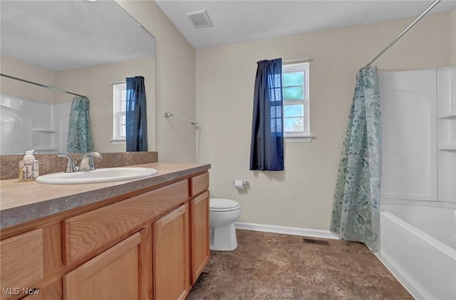 full bathroom with a wealth of natural light, visible vents, and toilet