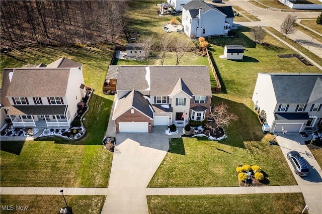 drone / aerial view with a residential view