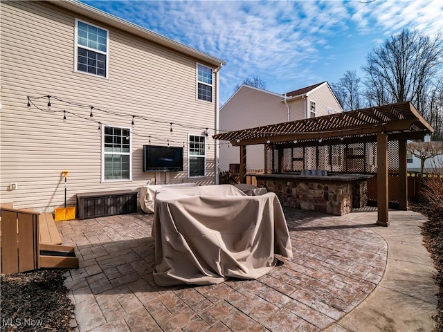 exterior space featuring area for grilling and a pergola