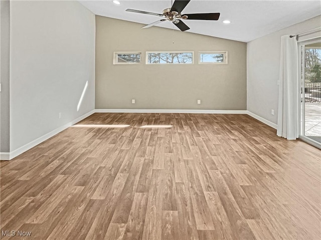 unfurnished room featuring ceiling fan, baseboards, lofted ceiling, recessed lighting, and wood finished floors