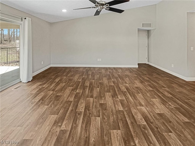 empty room with visible vents, a ceiling fan, wood finished floors, recessed lighting, and baseboards