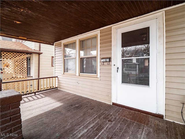 wooden deck featuring covered porch