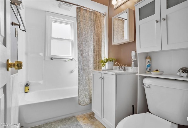 full bath featuring vanity, toilet, and shower / bath combo with shower curtain