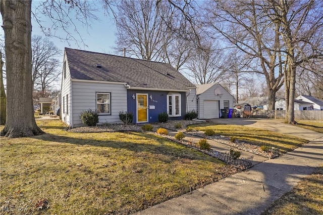 new england style home featuring a front lawn, fence, concrete driveway, a shingled roof, and a garage