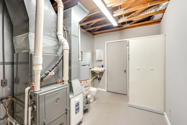 utility room with gas water heater