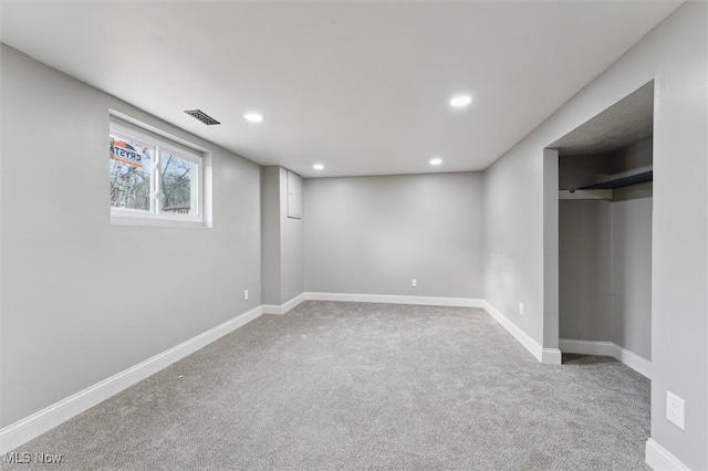 basement featuring recessed lighting, visible vents, carpet floors, and baseboards