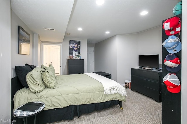 bedroom featuring recessed lighting, visible vents, and carpet floors