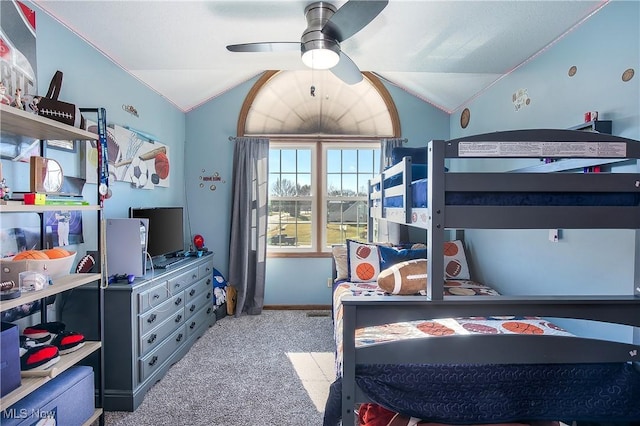 bedroom featuring lofted ceiling, carpet flooring, and baseboards