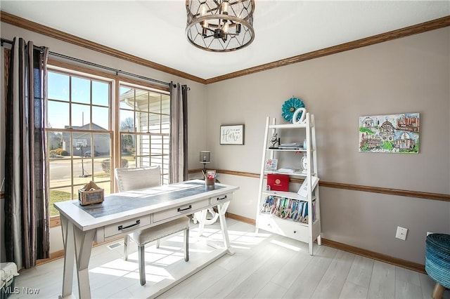 home office featuring a notable chandelier, crown molding, light wood-type flooring, and baseboards