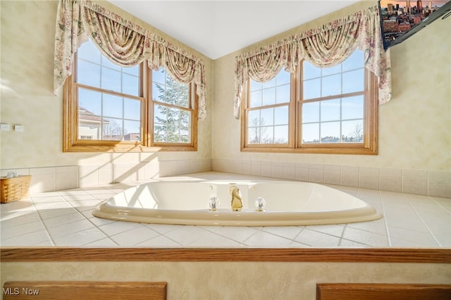 bathroom featuring a garden tub