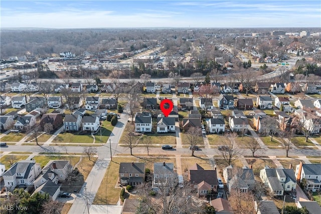 birds eye view of property with a residential view