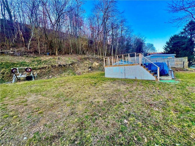 view of yard featuring a wooden deck