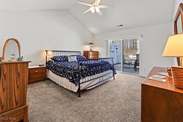 carpeted bedroom featuring access to exterior, visible vents, ceiling fan, and vaulted ceiling