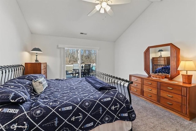 bedroom with visible vents, a ceiling fan, carpet floors, access to exterior, and vaulted ceiling