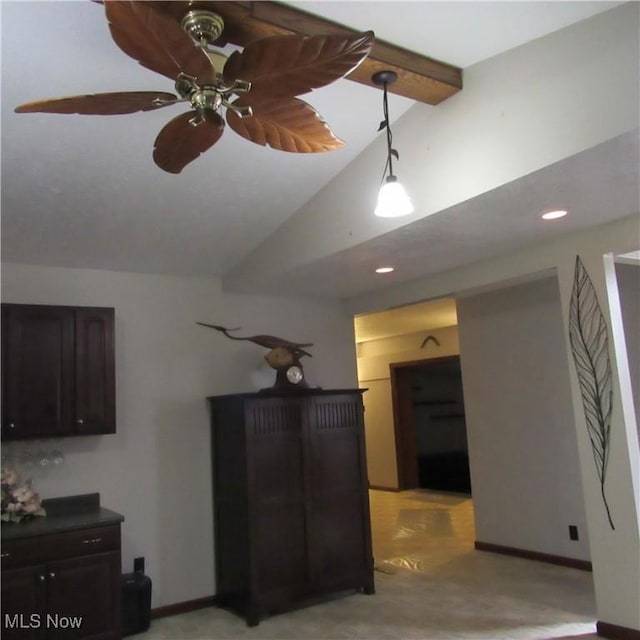 interior space featuring lofted ceiling with beams, recessed lighting, a ceiling fan, and baseboards