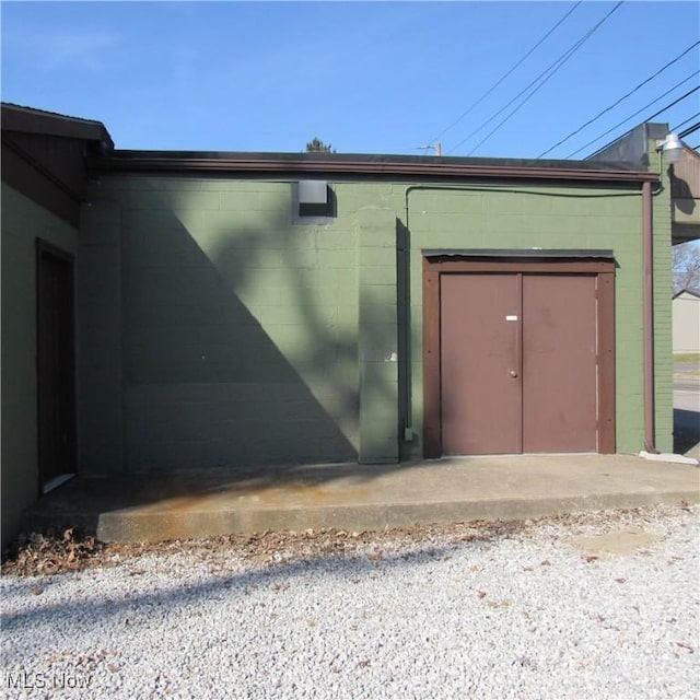 garage with a storage shed