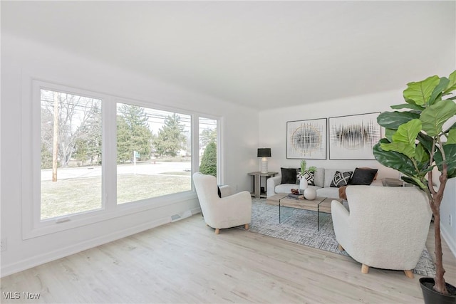 living area with wood finished floors