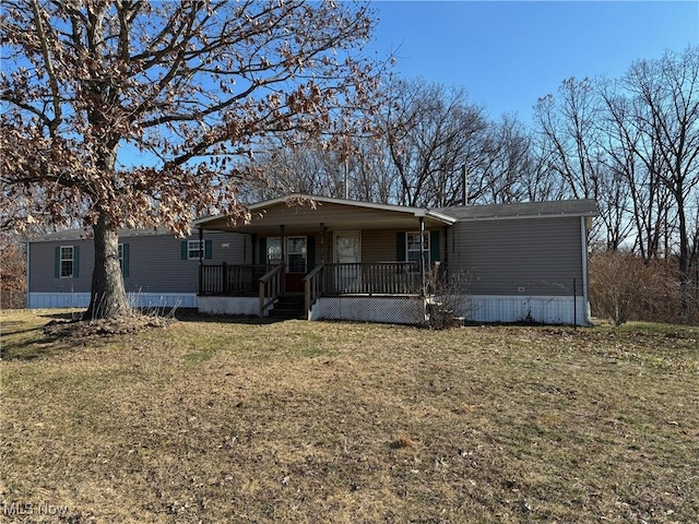 view of front of house featuring covered porch and a front lawn