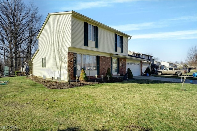 view of front of house with brick siding, a garage, driveway, and a front lawn