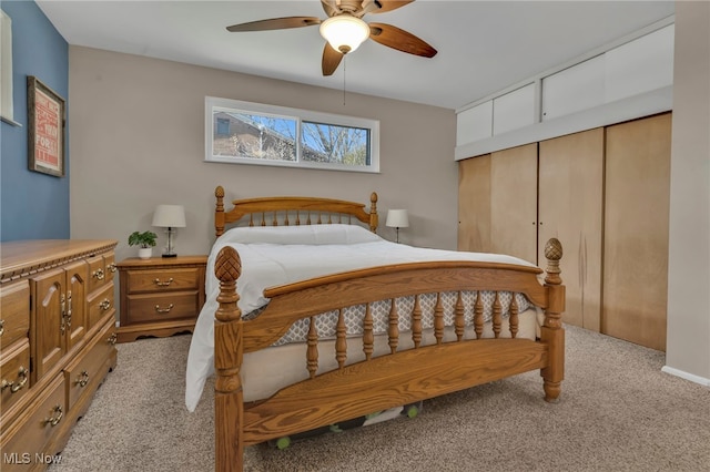 carpeted bedroom featuring a ceiling fan