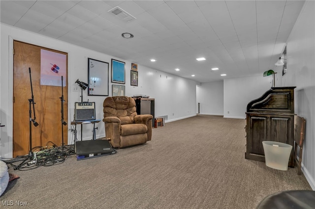 interior space featuring visible vents, recessed lighting, baseboards, and carpet