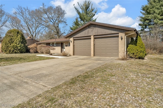 ranch-style house featuring a garage, brick siding, and driveway