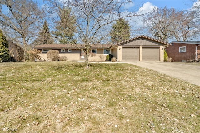 single story home with a garage, concrete driveway, and a front lawn