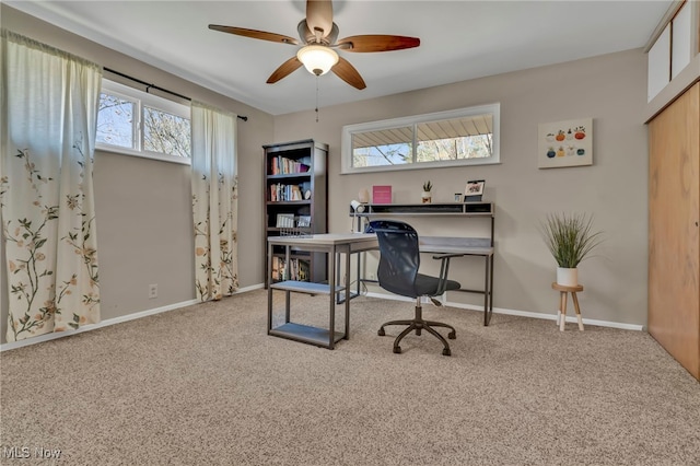 office area featuring baseboards, carpet, and ceiling fan