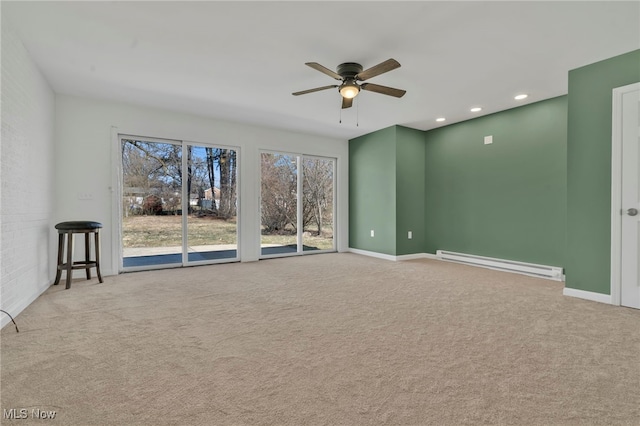 carpeted empty room with recessed lighting, baseboards, baseboard heating, and a ceiling fan