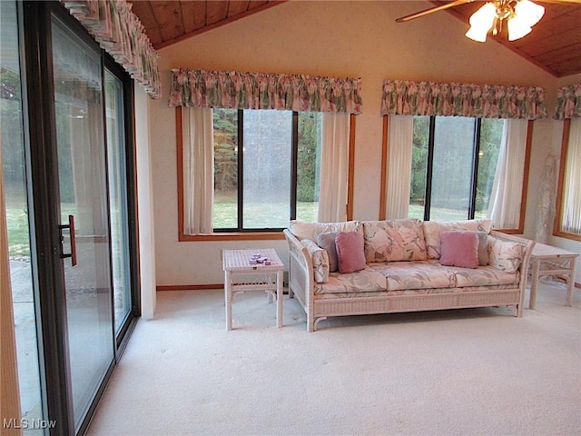 living area with vaulted ceiling, carpet flooring, and wooden ceiling