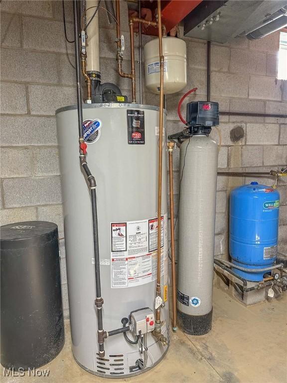 utility room with water heater