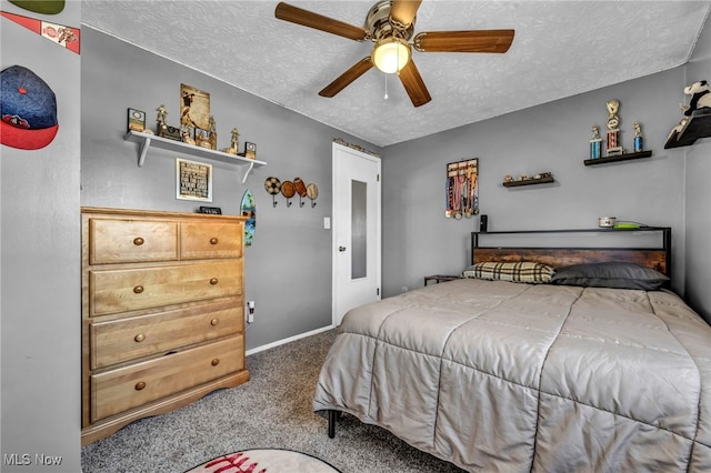 bedroom featuring baseboards, ceiling fan, a textured ceiling, and carpet