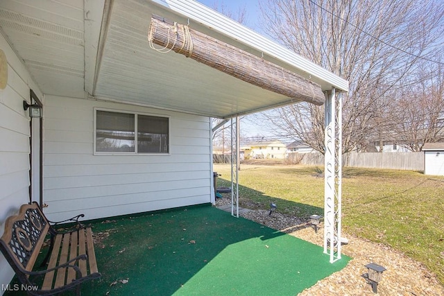 view of patio with fence