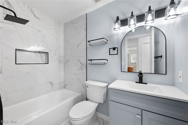 full bath featuring toilet, marble finish floor, vanity, and  shower combination