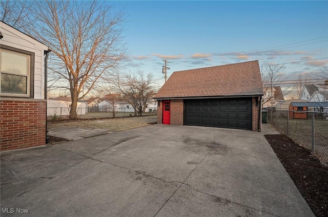 detached garage with fence