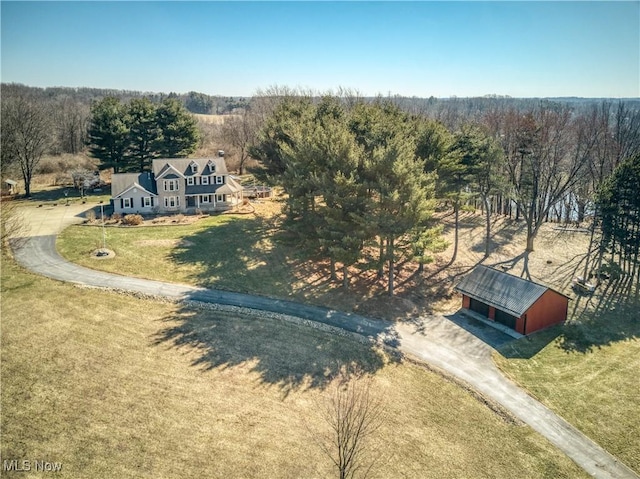 aerial view with a wooded view