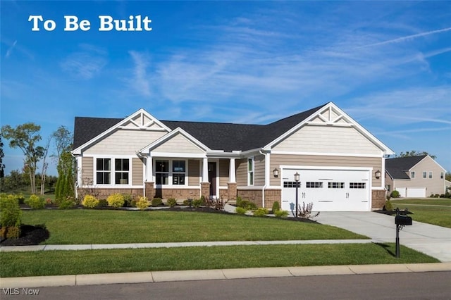 craftsman house featuring brick siding, driveway, an attached garage, and a front lawn