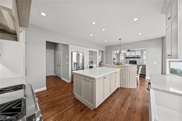 kitchen with recessed lighting, stainless steel appliances, and dark wood-style flooring