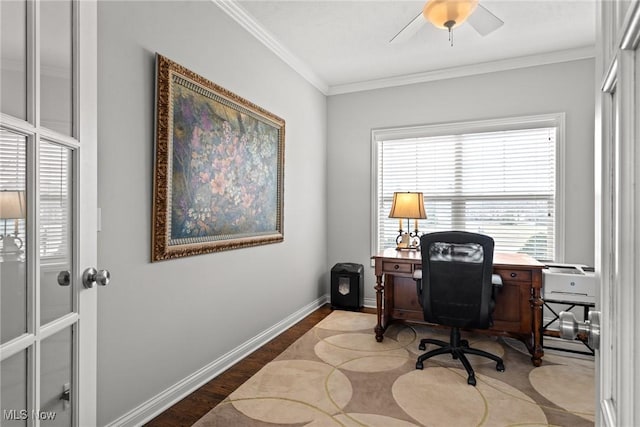 office space featuring crown molding, wood finished floors, baseboards, and ceiling fan