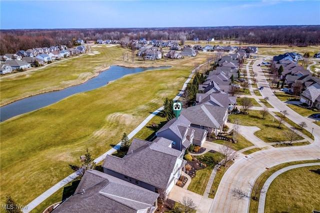 birds eye view of property with a residential view and a water view