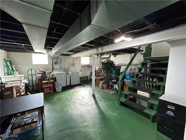 basement featuring washing machine and dryer