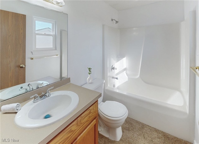 full bathroom featuring vanity, bathing tub / shower combination, and toilet